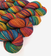 Load image into Gallery viewer, Rainbow on superwash Merino/yak/nylon sock yarn.
