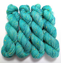 Load image into Gallery viewer, Aqua green on superwash merino with neon neps - DK.
