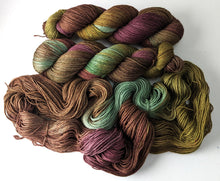 Load image into Gallery viewer, An autumnal frankenskein on cormo/silk 4ply/fingering weight.
