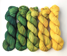 Load image into Gallery viewer, Green - gold gradient yarn set, on superwash BFL/nylon sock/4ply yarn.
