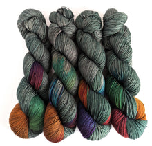Load image into Gallery viewer, Dark Winter Rainbow, on superwash merino/yak/nylon sock yarn.
