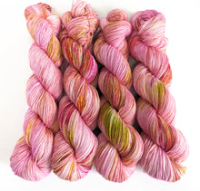 Load image into Gallery viewer, Aster on superwash merino/nylon sock yarn.
