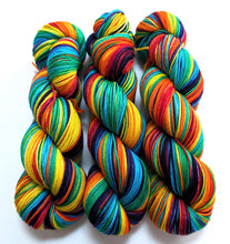 Load image into Gallery viewer, Rainbow on superwash merino/cashmere/nylon sock yarn.
