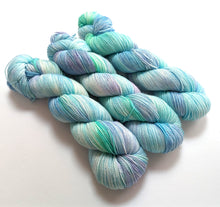 Load image into Gallery viewer, Sea Foam, on a superwash Merino/nylon/sparkle sock yarn.
