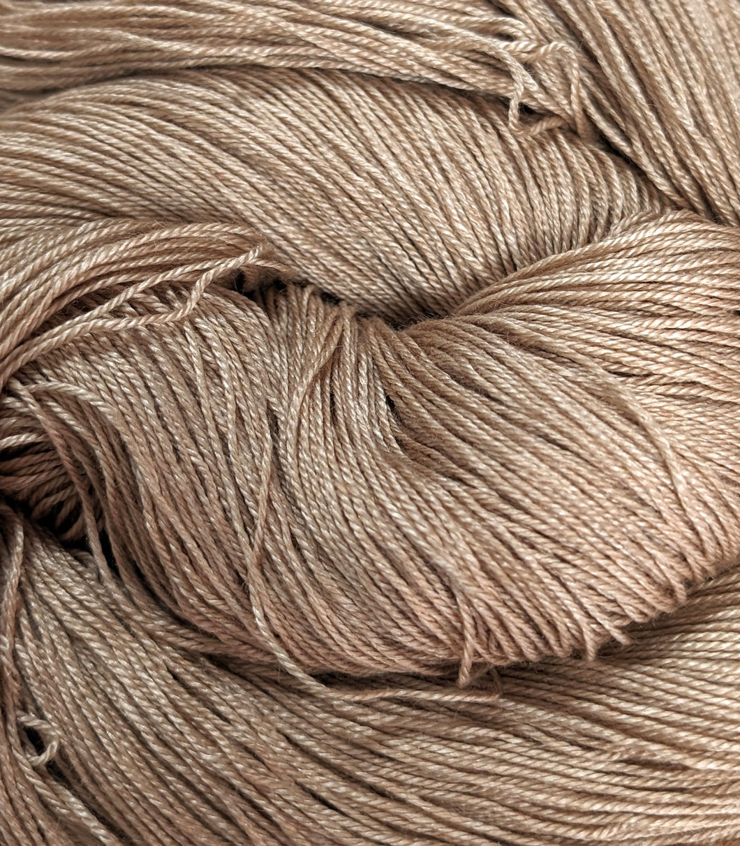 Undyed Baby camel/silk 4ply/fingering weight yarn.