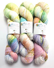 Load image into Gallery viewer, Spring Has Sprung on superwash Merino/nylon/sparkle sock yarn.
