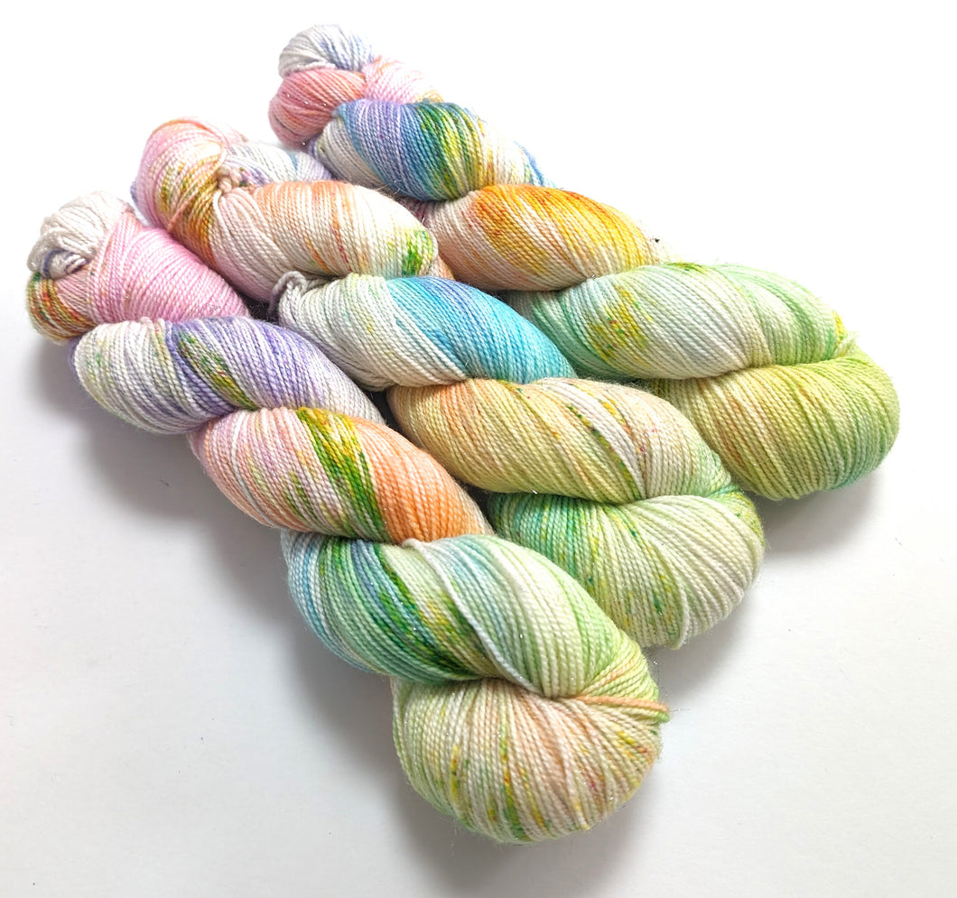 Spring Has Sprung on superwash Merino/nylon/sparkle sock yarn.