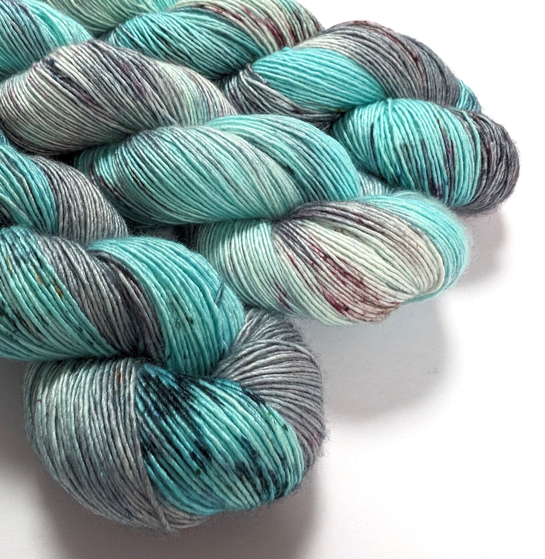 Curative Colours on superwash Merino/Silk singles 4ply/fingering weight.