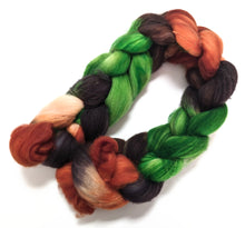 Load image into Gallery viewer, Greens and browns on superwash Polwarth/nylon fibre.
