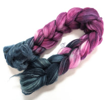Load image into Gallery viewer, Purples and teal on superwash Polwarth/nylon fibre.
