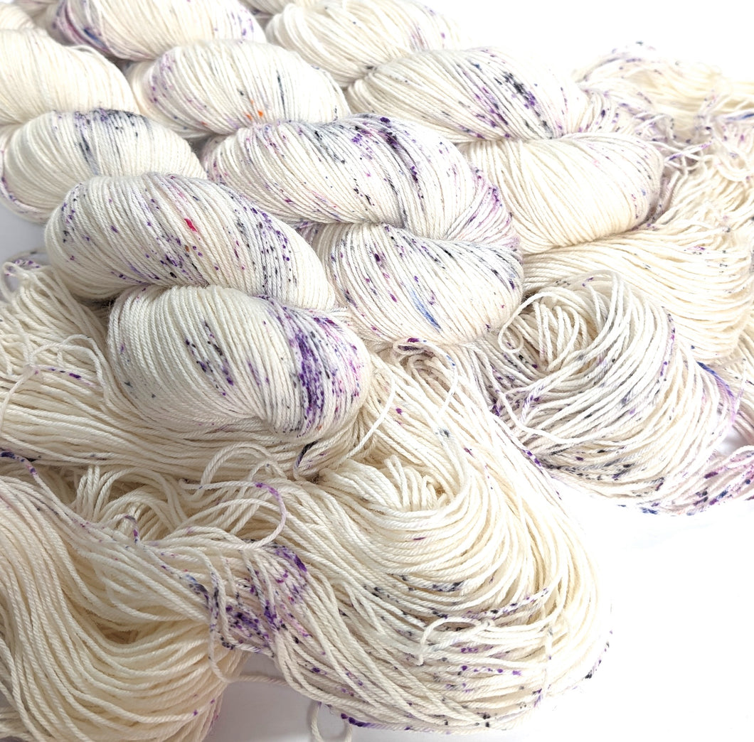Gothic Speckles, on Superwash BFL/Nylon sock yarn.