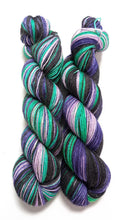 Load image into Gallery viewer, Witches&#39; Brew on 100% llama 4ply/fingering weight yarn. Natural base.
