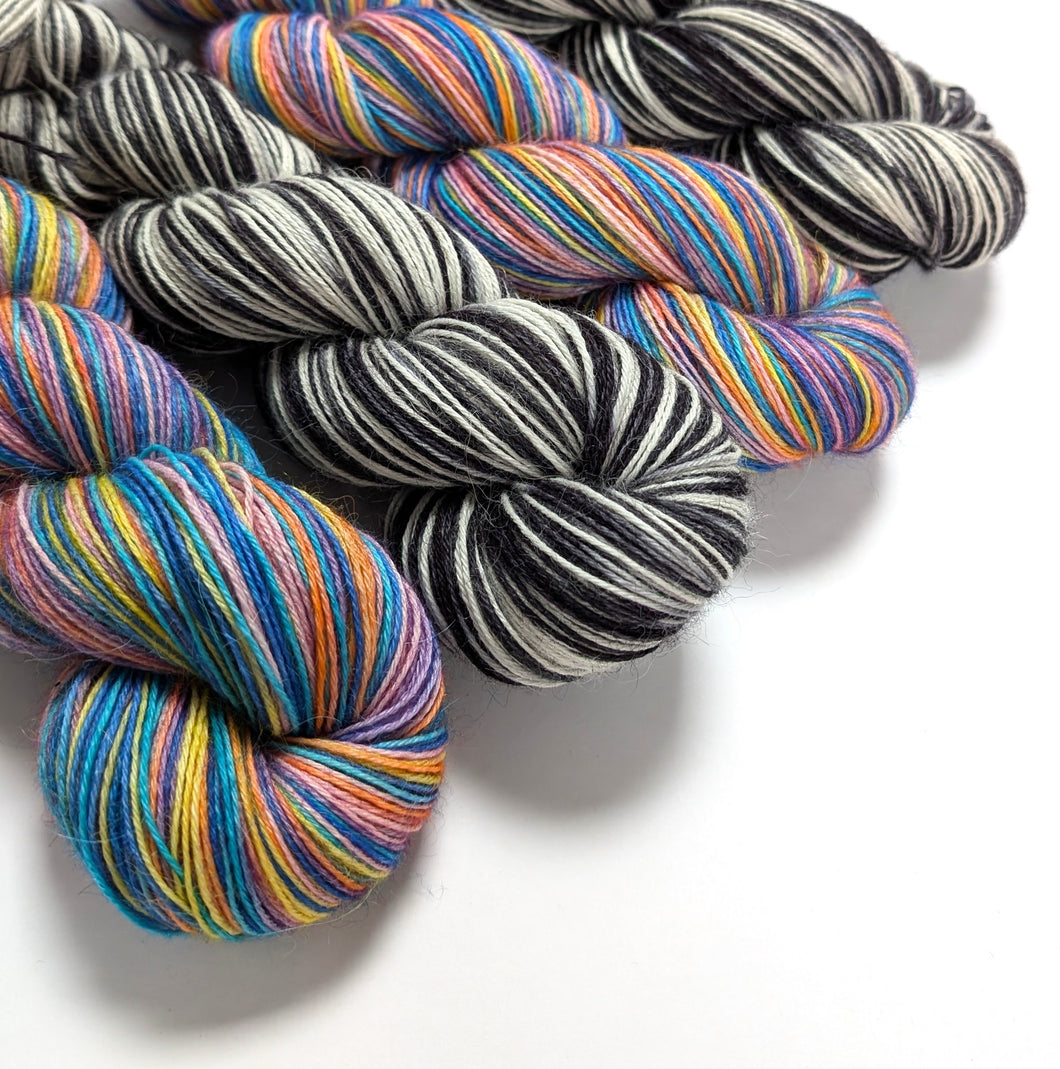Wednesday's Window on 100% llama 4ply/fingering weight yarn. Natural base.