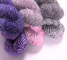 Load image into Gallery viewer, Purple - grey yarn set, on superwash BFL/silk 4ply with matching alpaca yak fluff.

