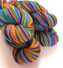 Load image into Gallery viewer, Wintertime Rainbow on Talamh sock yarn.
