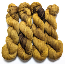 Load image into Gallery viewer, Old Gold on superwash BFL/nylon sock yarn.
