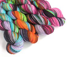 Load image into Gallery viewer, Hair Up! on high twist superwash merino/nylon &quot;Zebra&quot; sock yarn.
