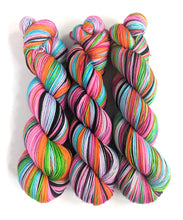 Load image into Gallery viewer, Hair Up! on a superwash merino/nylon sock yarn.
