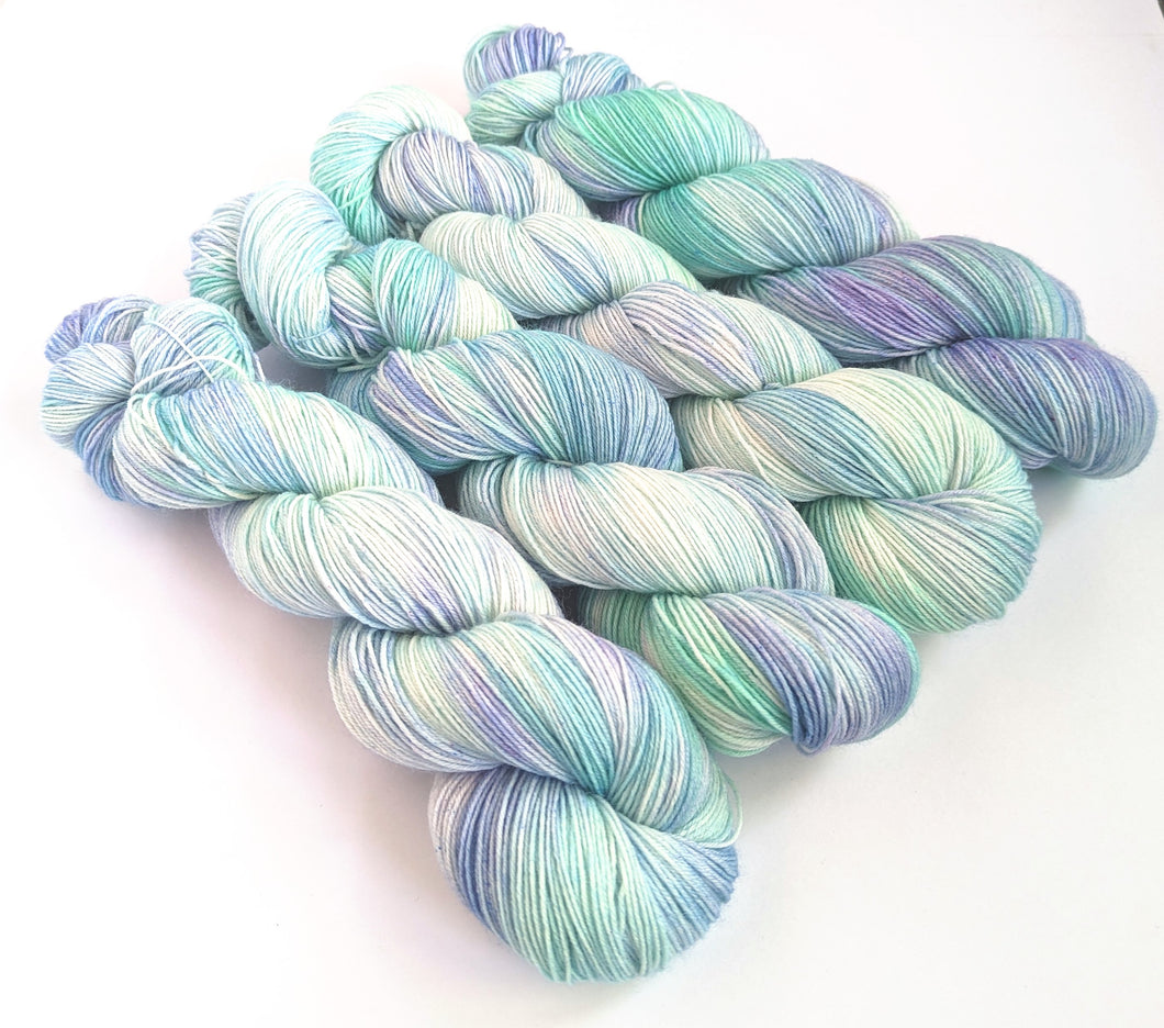 Sea Foam on superwash BFL/nylon sock yarn.