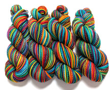Load image into Gallery viewer, Rainbow on high twist superwash merino/nylon &quot;Zebra&quot; sock yarn.
