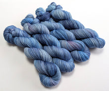 Load image into Gallery viewer, Dusty Blue Jeans, on various bases.

