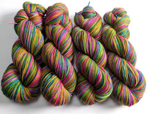 Load image into Gallery viewer, Multicoloured skeins of yarn on a white background
