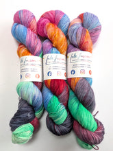 Load image into Gallery viewer, Ironic on 100% llama 4ply/fingering weight yarn. Off-white base.
