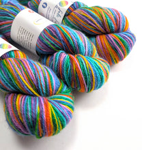Load image into Gallery viewer, Colorful skeins of yarn with labels on a white background
