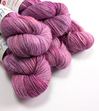 Load image into Gallery viewer, Frankenskein on 100% llama 4ply/fingering weight yarn. Off-white base.
