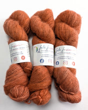 Load image into Gallery viewer, Three skeins of orange yarn with Felt Fusion labels on a white background
