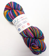 Load image into Gallery viewer, Wintertime Rainbow on high twist superwash merino/nylon "Zebra" sock yarn.
