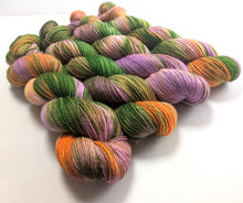 Load image into Gallery viewer, Multicolored yarn skeins on a white background

