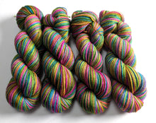 Load image into Gallery viewer, Multicoloured yarn skeins on a white background
