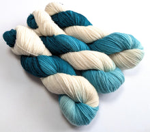 Load image into Gallery viewer, Three skeins of teal and white yarn twisted on a white background

