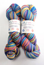 Load image into Gallery viewer, Two skeins of multicolored yarn with &#39;Felt Fusion&#39; labels on a white background
