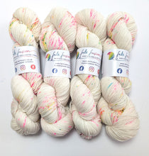 Load image into Gallery viewer, Snot Cake on a superwash Merino/nylon/sparkle sock yarn.
