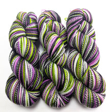 Load image into Gallery viewer, Multicolored skeins of yarn on a white background
