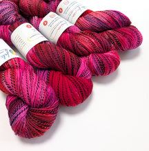 Load image into Gallery viewer, Frankenskein on high twist superwash merino/nylon "Zebra" sock yarn.
