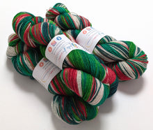 Load image into Gallery viewer, Holly Jolly Christmas on Exmoor sock yarn.
