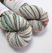 Load image into Gallery viewer, Murder On The Dancefloor on high twist superwash merino/nylon "Zebra" sock yarn.
