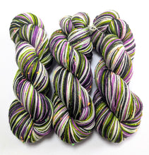 Load image into Gallery viewer, Multicolored yarn skeins on a white background
