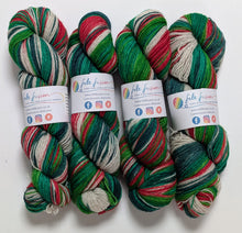 Load image into Gallery viewer, Holly Jolly Christmas on Exmoor sock yarn.
