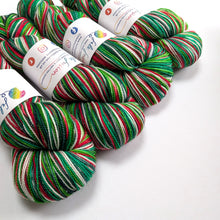 Load image into Gallery viewer, Holly Jolly Christmas hand dyed on Superwash Merino/Nylon/Sparkle sock yarn.
