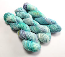 Load image into Gallery viewer, Sea Foam on superwash merino/cashmere/nylon DK yarn.
