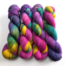 Load image into Gallery viewer, Colorful skeins of yarn in purple, pink, green, and yellow on a white background
