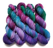 Load image into Gallery viewer, Peacock on superwash merino/nylon sock yarn.
