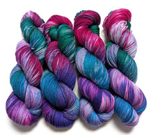 Load image into Gallery viewer, Peacock on superwash merino/cashmere/nylon sock yarn.
