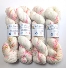 Load image into Gallery viewer, Four skeins of yarn with colorful speckles on a white background, featuring Felt Fusion labels.
