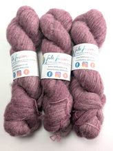 Load image into Gallery viewer, Three skeins of pink yarn with labels on a white background
