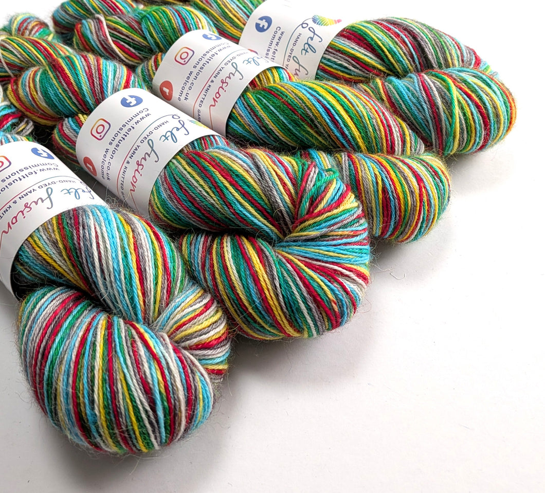 Colorful skeins of yarn with labels on a white background